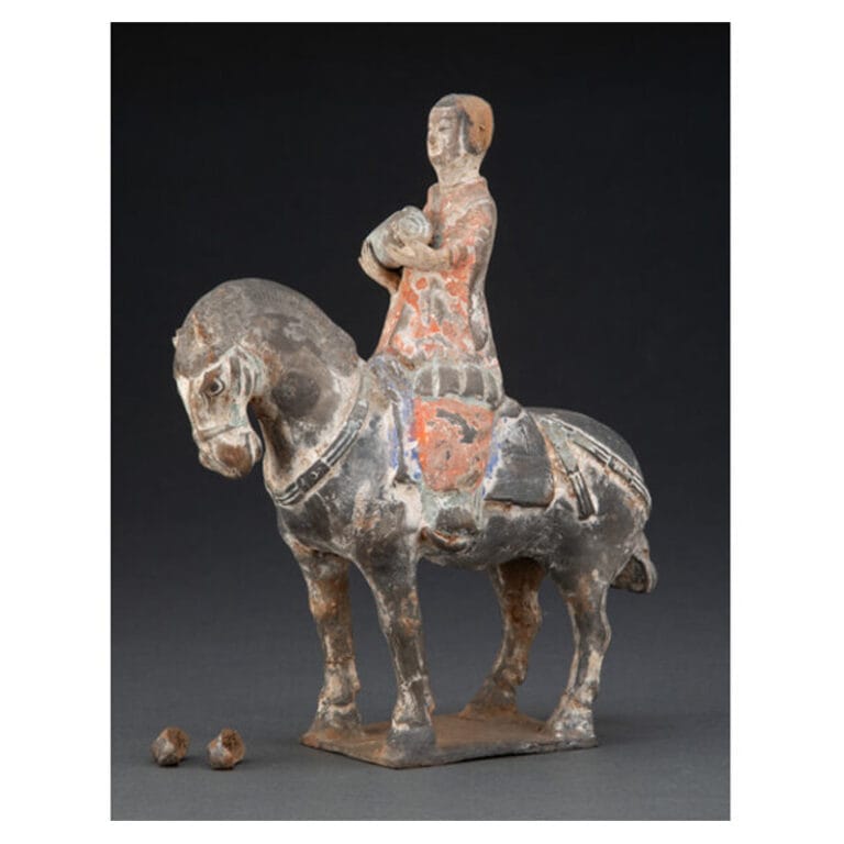 A Chinese Pottery Figure of a Horse and Rider, Wei Dynasty