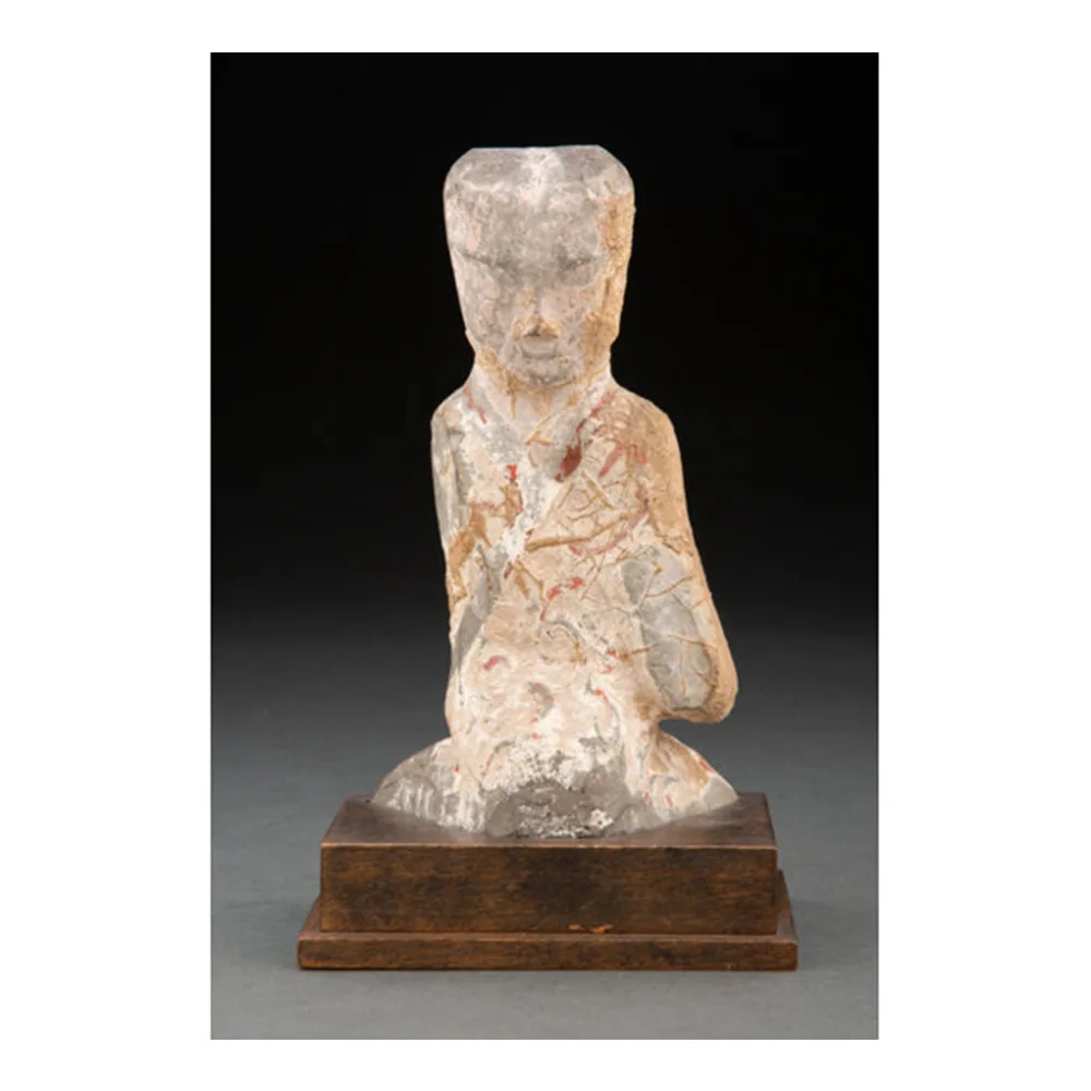 A Chinese Earthenware Kneeling Figure, Han Dynasty